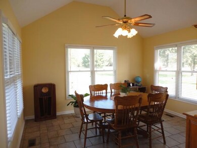  13x12 / Formal Dining Room that leads out to the back deck to relax on.