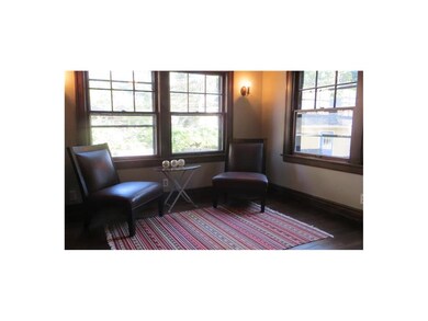 Sitting Room behind bar.