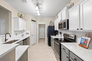 Spacious kitchen with quartz countertops