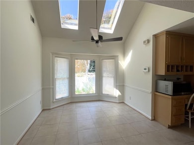 Breakfast area with bay window, and a skylight