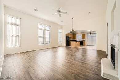 Living Room with 12' Ceilings and Fireplace