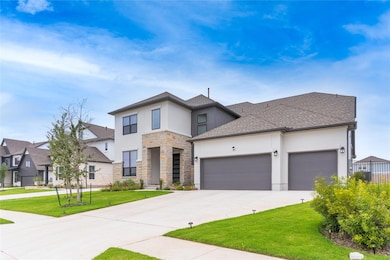 Contemporary house with stucco siding, a garage, 
