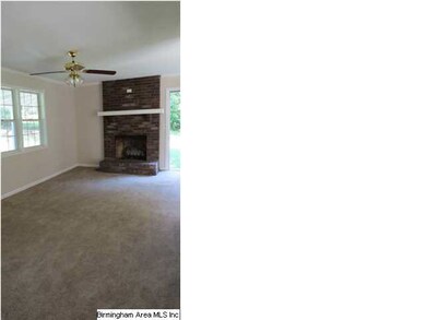 Living room with brick fireplace (gas logs)
