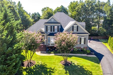 View of front of house featuring a front lawn