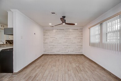 9203 Bisley Ln, Houston, TX 77088 - photo 7