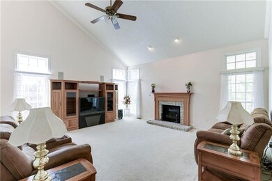 A two-story family room is a great place to gather