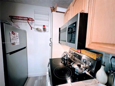 6070 W 18th Ave unit 209, Hialeah, FL 33012 - photo 2