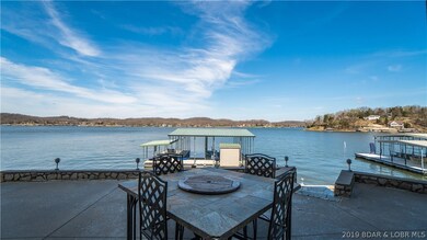 Check out this patio furniture! You are just a few steps to the dock! Nothing better than that!