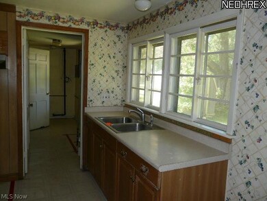 4875 Elmwood Dr, Sheffield Lake, OH 44054 - photo 7