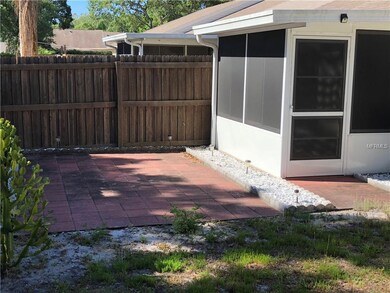 EXTENDED SUN ROOM AND OUTSIDE PATIO.