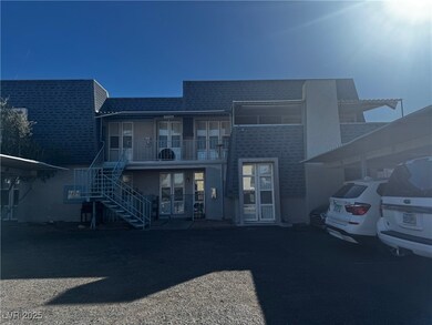 View of property featuring stairway