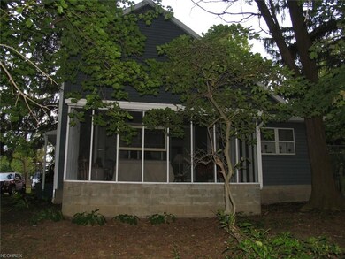 East side view of screened in porch.