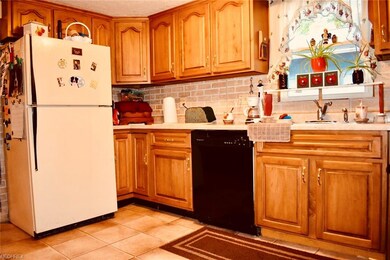 The kitchen has ample cabinet space.
