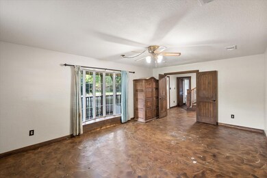 Spare room featuring a textured ceiling and ceilin