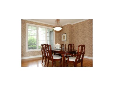 The formal dining room has a long niche in the wal