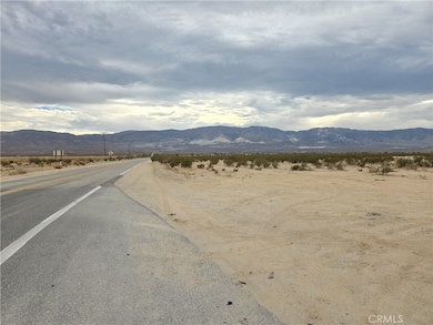 View of Camp Rock road adjacent to parcel, looking south