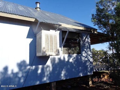Ext hs Evap & porch.JPG