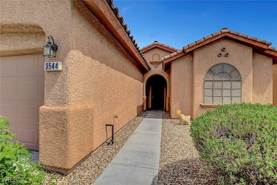 Property entrance with stucco siding