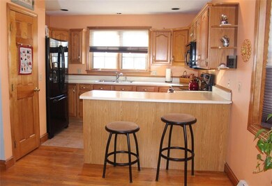 Efficient Kitchen with Breakfast Bar.