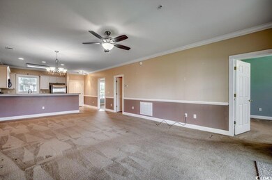 Unfurnished living room with ceiling fan with nota