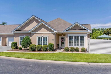 View of front of property with a front yard