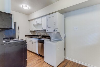 Kitchen featuring appliances with stainless steel