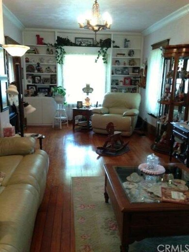 Living area from opposite side.  Built in shelving