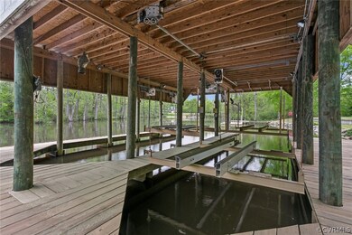 3 boat Lifts, Extensive Decking to walk around the