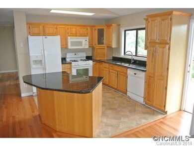 Ample kitchen with granite