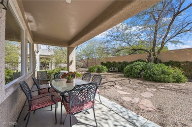 Fenced backyard featuring outdoor dining area and