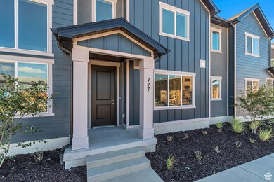 Entrance to property with board and batten siding