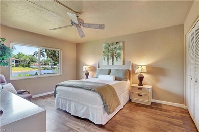 Main Bedroom with ceiling fan, and vinyl wood look