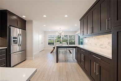 705 Neapolitan Way, Naples, FL 34103 - photo 3