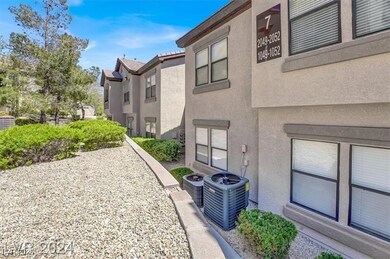View of side of property featuring stucco siding and a residential view
