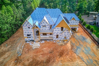 View of front of property featuring a high end roof
