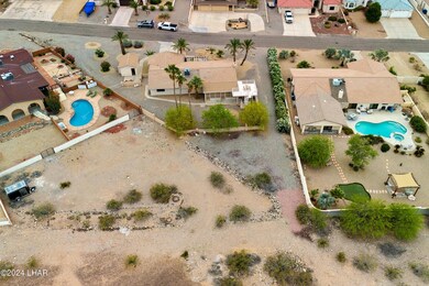 Backs to City Owned Land!