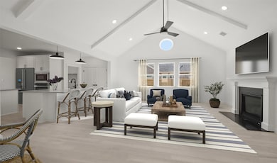 Impressive great room with high vaulted ceilings (