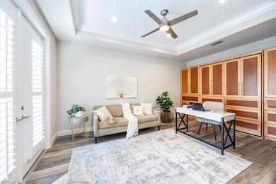 Den/Office/ 4th bedroom area with hardwood / wood-