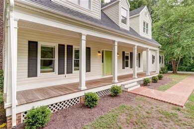 Brick sidewalk leading from paved driveway (with o