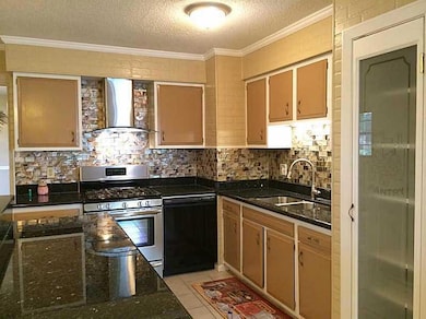 Kitchen. Freshly painted cabinets with granite cou