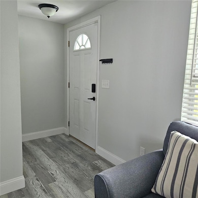 Entrance with coat closet.