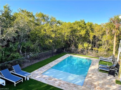 View of pool with a patio, a fenced backyard, and grilling area