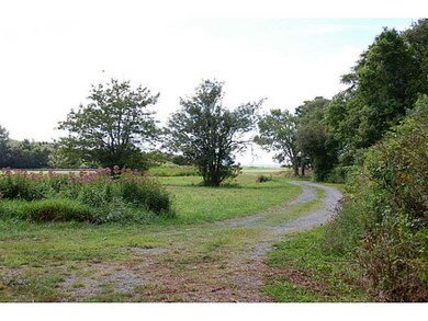 Exterior Front. Right of way to river