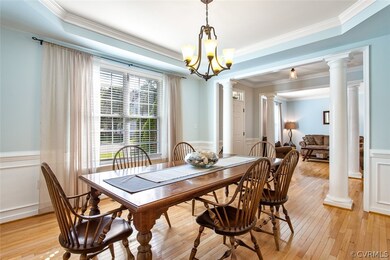 Formal dining room view into the foyer and the for