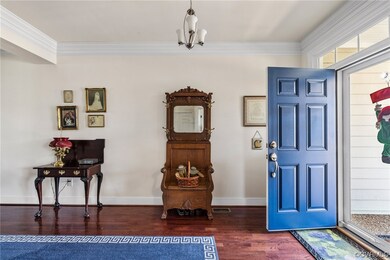 Sunny foyer with storm door to let natural light i
