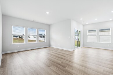 Spare room with light wood-type flooring
