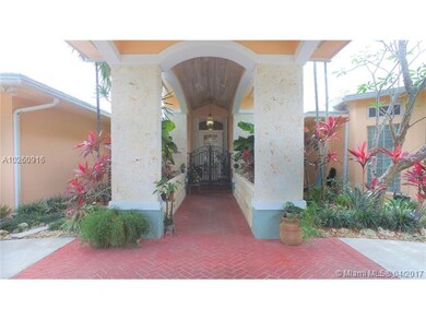 Covered porch to the house, driveway pavered, keys