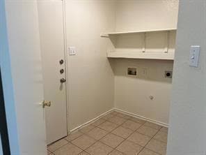 Laundry area with electric dryer hookup and washe