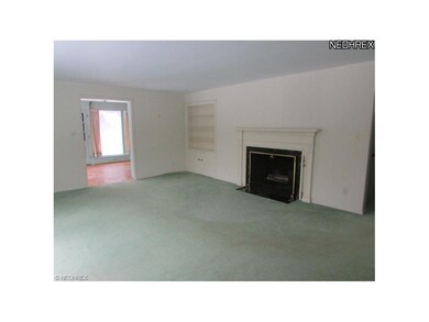 Formal living room, fireplace with Marble trim. Gr