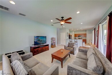 Great Room ~ Spacious. Sliders Open to Screened La